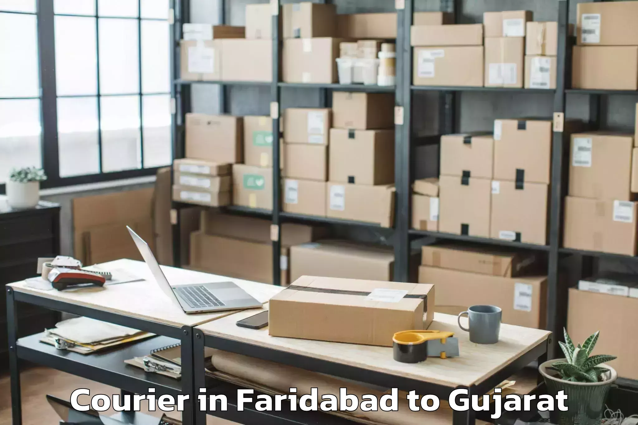 Affordable Faridabad to Khambhalia Courier